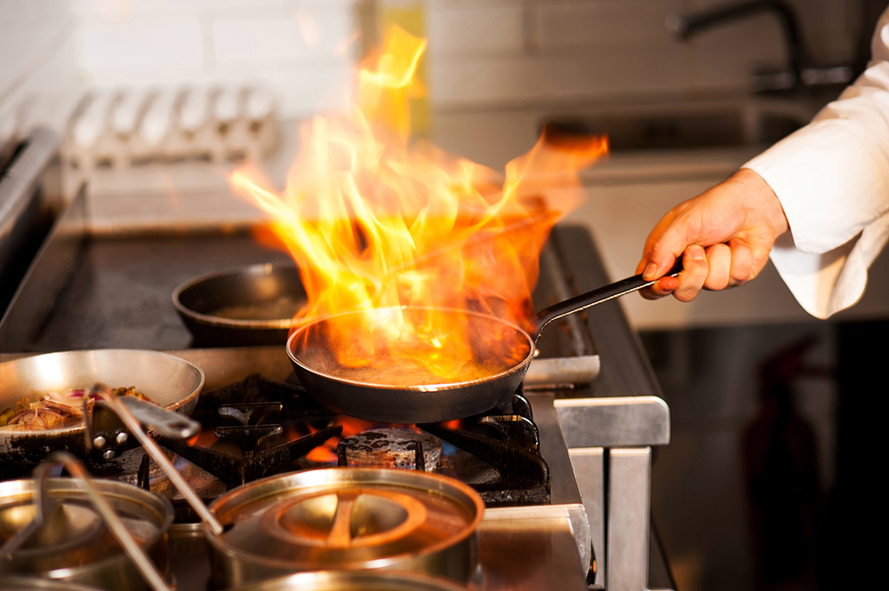 Restaurant stove grease cleaning