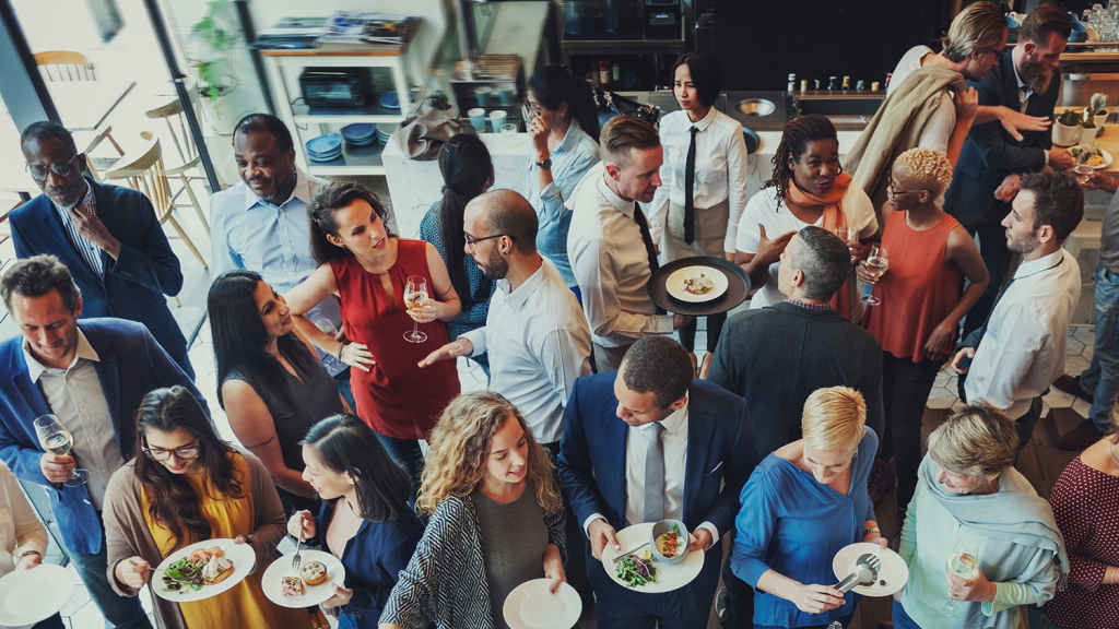 Overhead shot of guests at a restaurant enjoying a private event party
