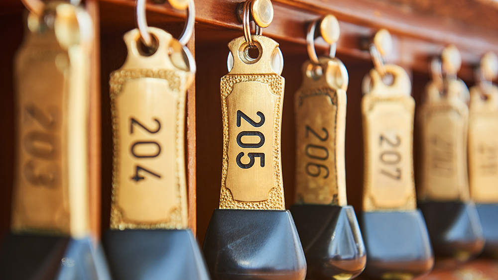 Up close shot of a series of old hotel keys