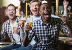 Three men at a sports bar