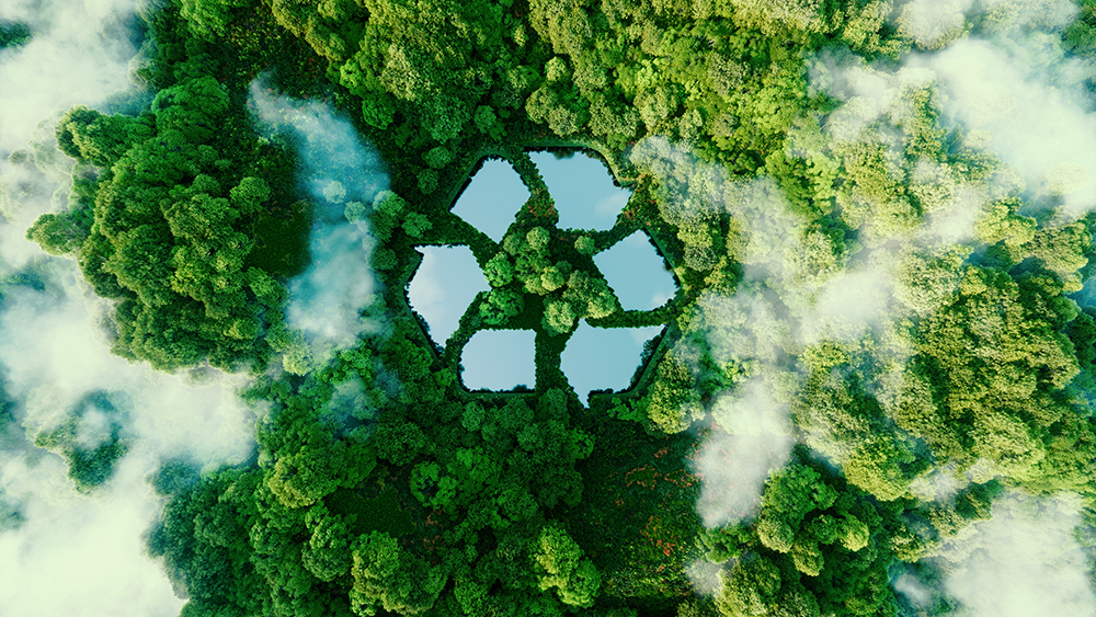 A lake in the shape of a recycling sign in the middle of untouched nature. 