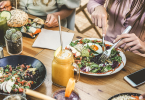 Young restaurant guests eating brunch